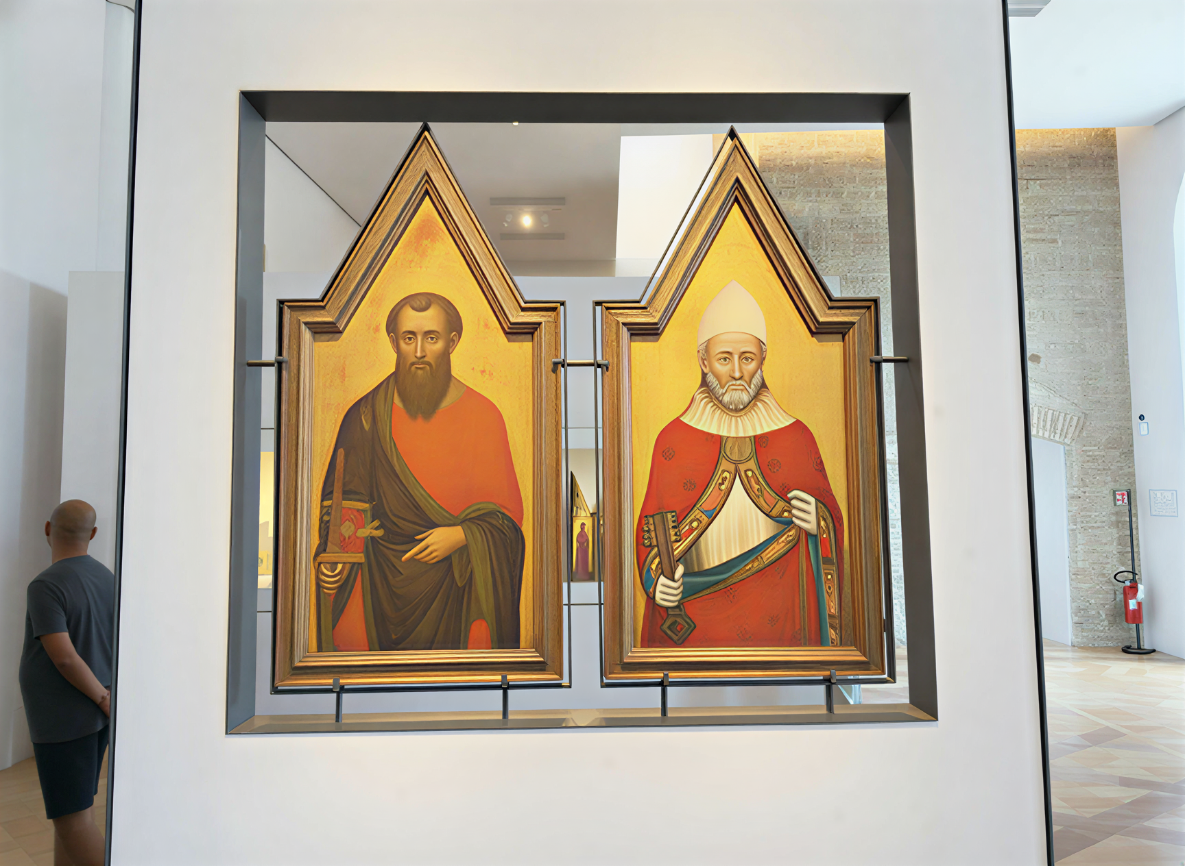 Diptyque illustrant deux figures historiques de la Renaissance italienne, exposé à la Galleria Nazionale dell'Umbria à Pérouse, mettant en avant la richesse culturelle de l'Ombrie.