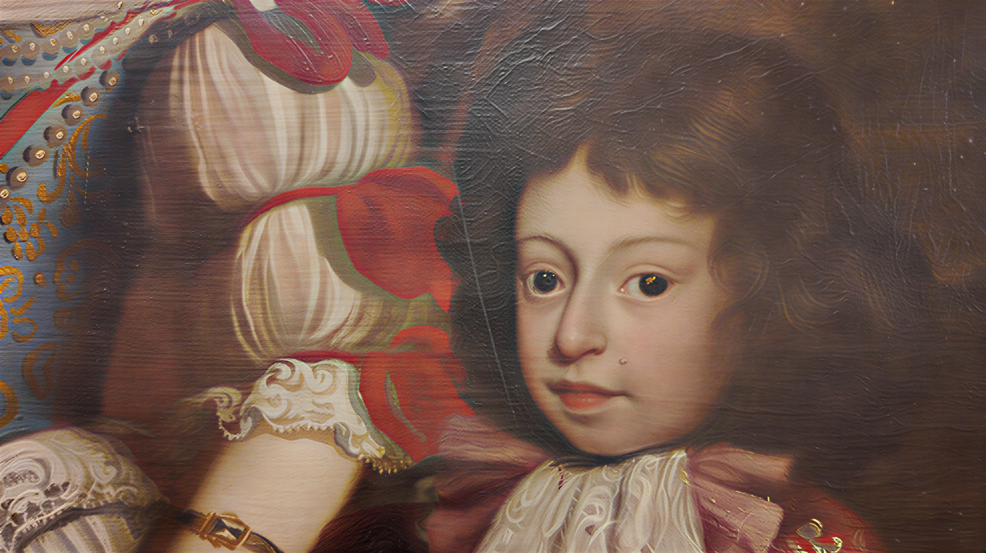 Détail d’une peinture montrant le visage d’un enfant en costume.