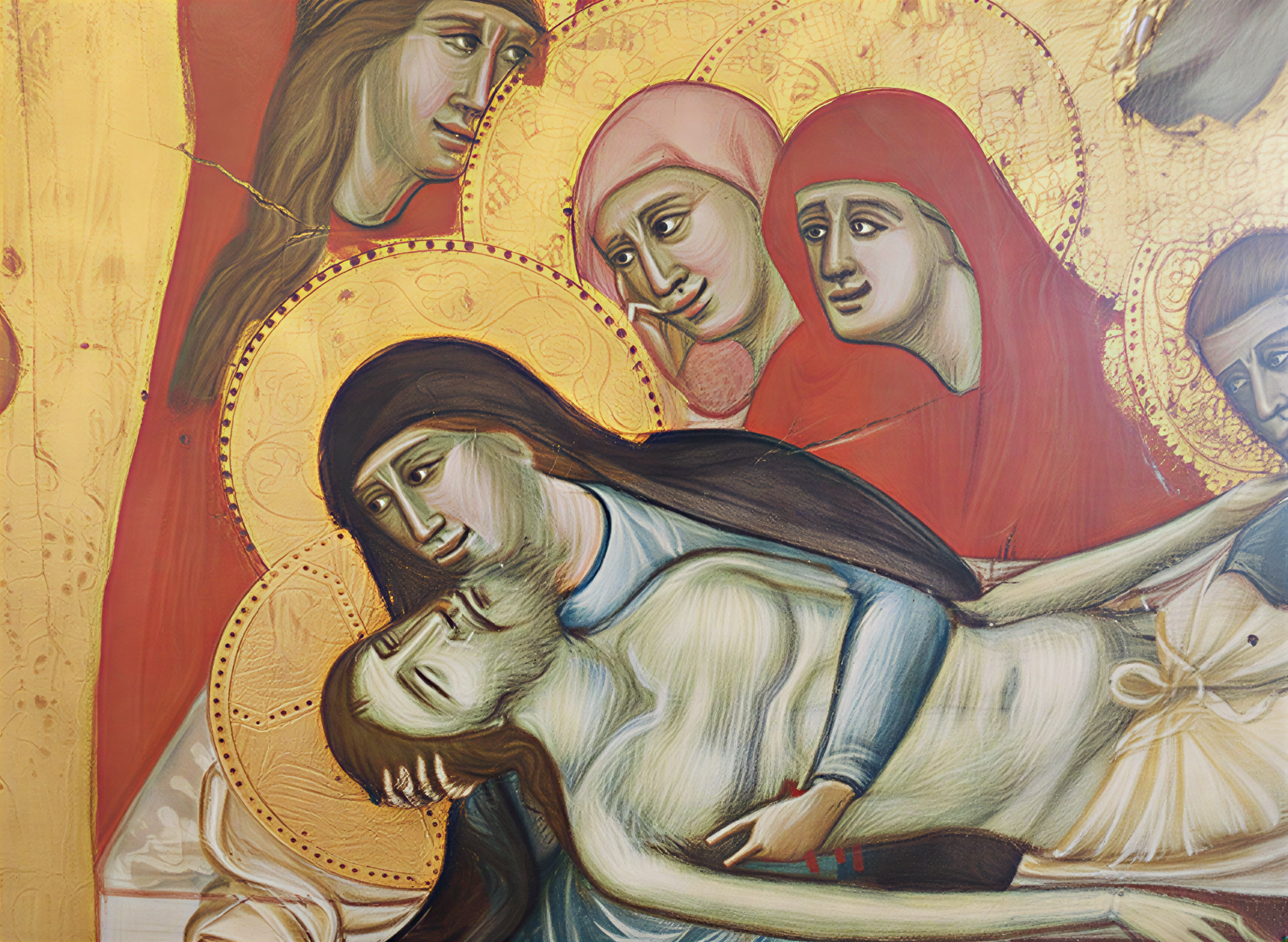 Détail de la Pietà, illustrant la Vierge Marie tenant le Christ, une œuvre emblématique de la Renaissance italienne, exposée à la Galleria Nazionale dell'Umbria.